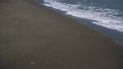 Beach Waves Crashing Coastline Outdoors. Sea Foam Storming Blue Shore Nature Background