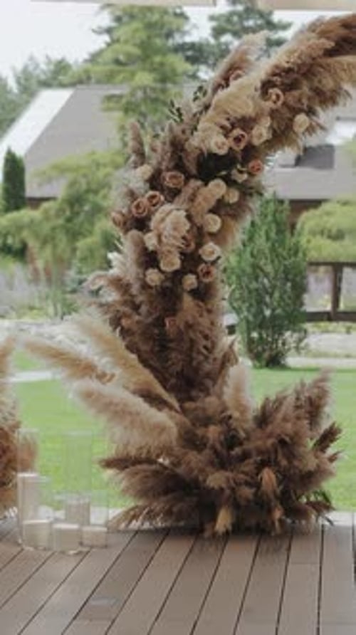 Wedding Decorations: Floral Arch with Pampas Grass and Candles