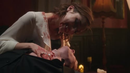 Slow Motion of Blood-Covered Vampire Woman Smiling Down at Lying Man