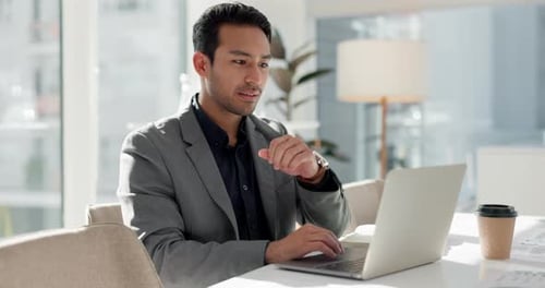 Happy man in office with laptop, market research and notes for social media review