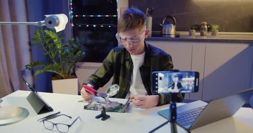 Influencer Boy Recording Video Blog. Web Cam Vlogger Home Live Stream. Teenage Schoolboy is Studying