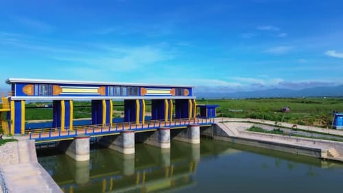 Aerial View of Water Control Structure in Rural Landscape.