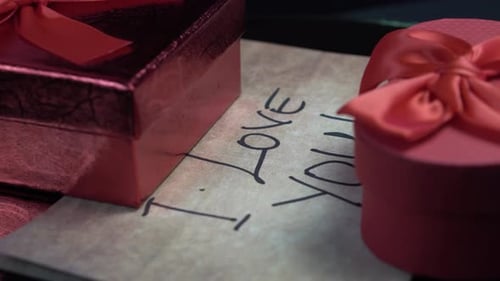 Red Valentine's Day Gift Boxes and I Love You Written Message, Close Up