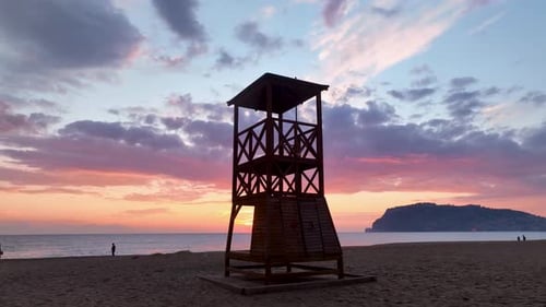 Rescue Tower on the Seashore Aerial View and a Very Beautiful Sunset