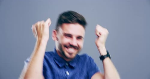 Enthusiastic Man Dancing and Celebrating Success