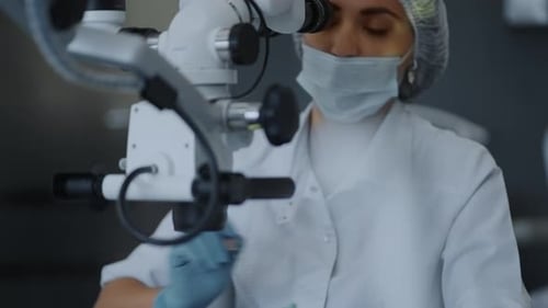 Health Professionals Team Performing Endoscopic Operation And Examination In Medical Clinic