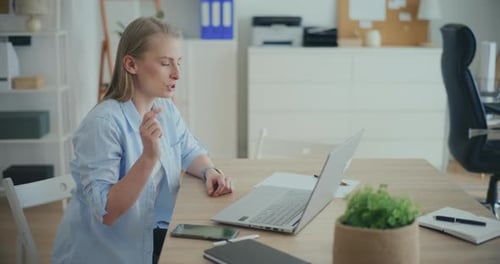 Woman Having Video Call Online Meeting In Office