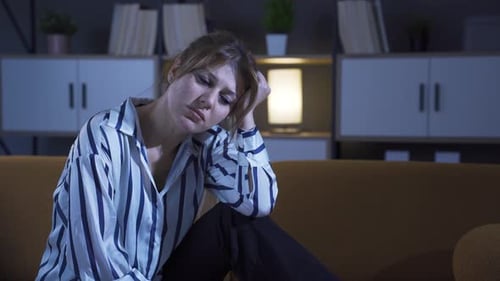 Unhappy woman is helpless and sad.