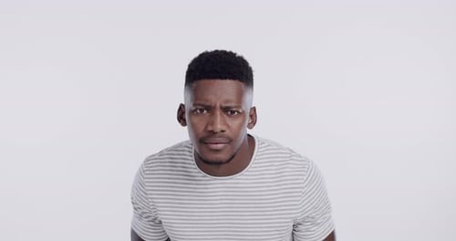 Man, face and confused head scratch in studio for question thinking, uncertain or white background