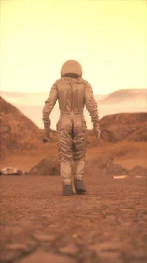Astronaut Walks on Red Planet Surface in Space Exploration Animation