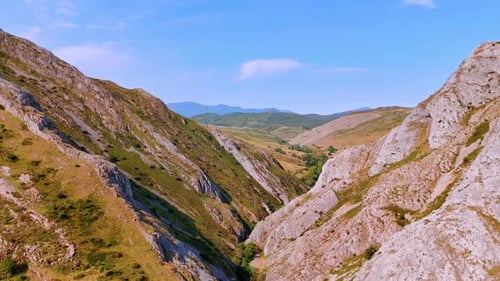 Scenic Mountain Valley Aerial View on a Sunny Day