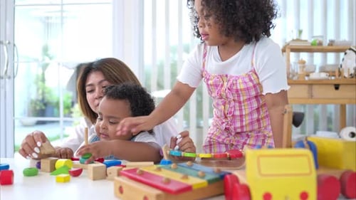 Woman and Children Playing with Toys