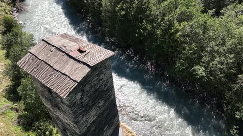 Aerial view of Tower of Love in Village Kala on the road that separates Mestia from Ushguli