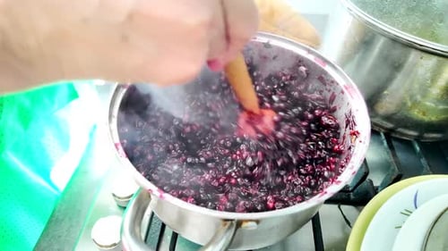 Making Berry Jam in a Kitchen