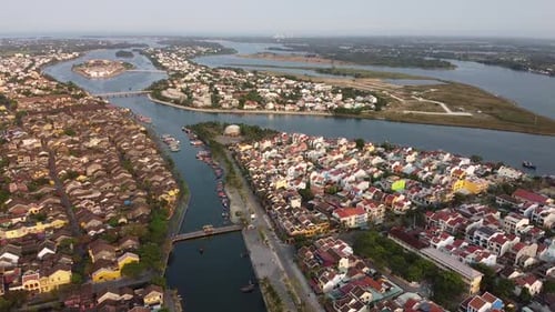 The Peaceful Aerial View of Hoi An Old Town and River on a Bright Day
