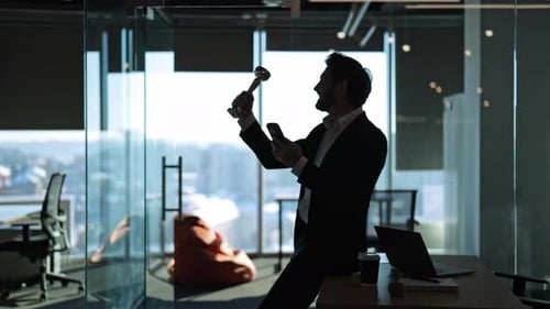 Joyful Professional Celebrates Trophy Win in Office