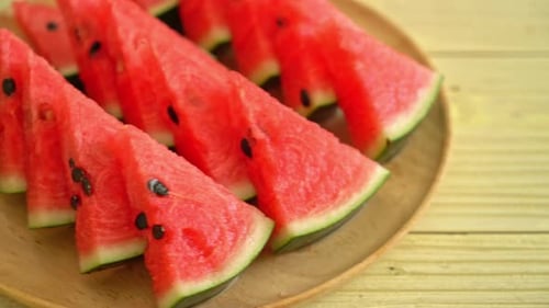 fresh watermelon sliced on plate