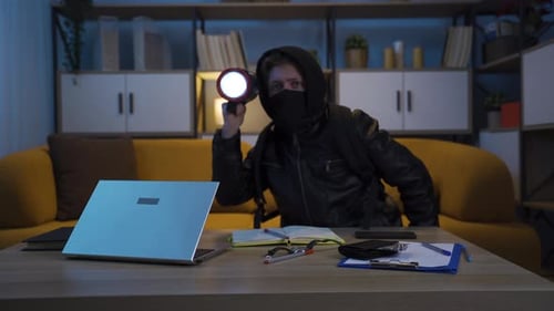 Burglar Enters House and Searches for Valuables