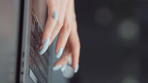 Woman Typing on Laptop Close Up