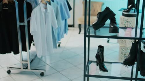 Empty Modern Clothing Store Filled with Formal Wear Designs