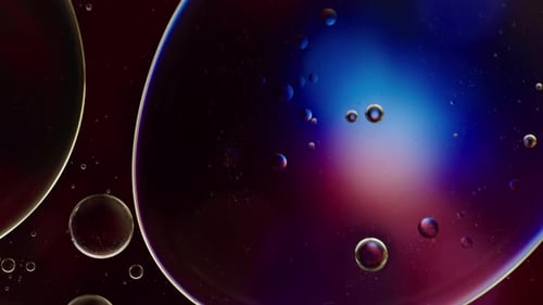 Abstract Bubbles Against Dark Blue and Red Backdrop