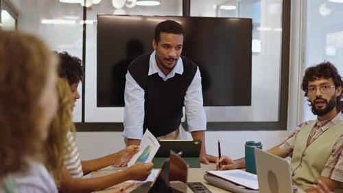 Diverse Business Team Collaborating in a Modern Office Meeting