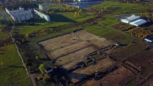 Aerial view of Crane Assembles Foundation Blocks At The Construction Site