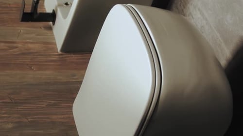 Modern White Wall Mounted Toilets in Bathroom