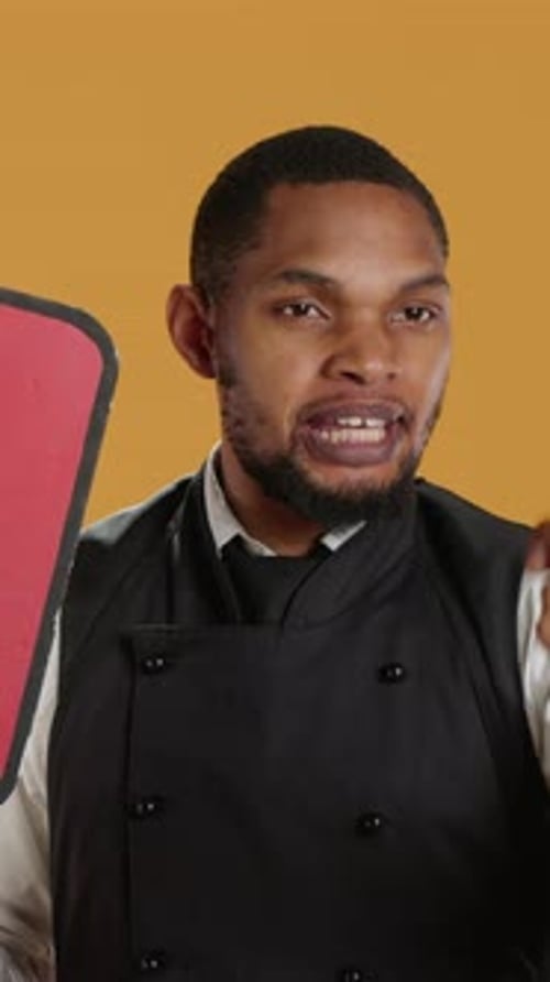Vertical Video Waiter Does an Advertisement for Politics and Showing a Speech Bubble