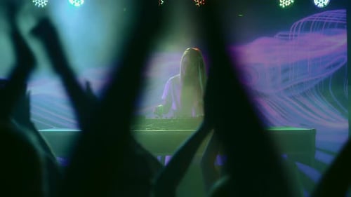 DJ Plays Disco Music on Turntable at Night Club Scene. Partying Joyful