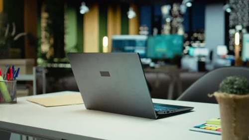 Professional Empty Office Features Computers and Forecasting Equipment