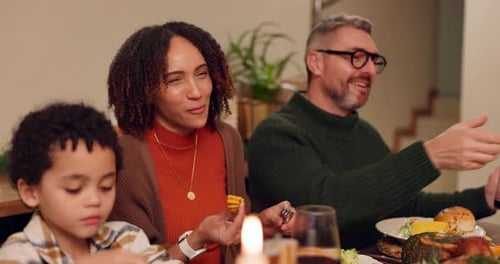 Family Meal Around Dining Table at Home