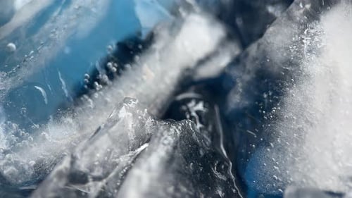 Rotation Pieces Of Melted Ice In The Ocean Background
