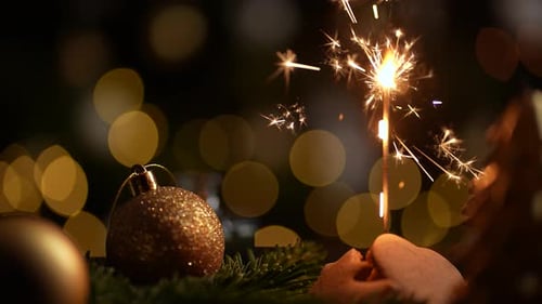 Lighting a Christmas Sparkler Decoration Close Up