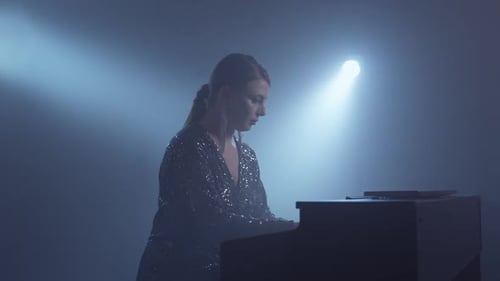 Pianist Playing Piano in Smoky Studio Young Woman in Dress Plays the Piano