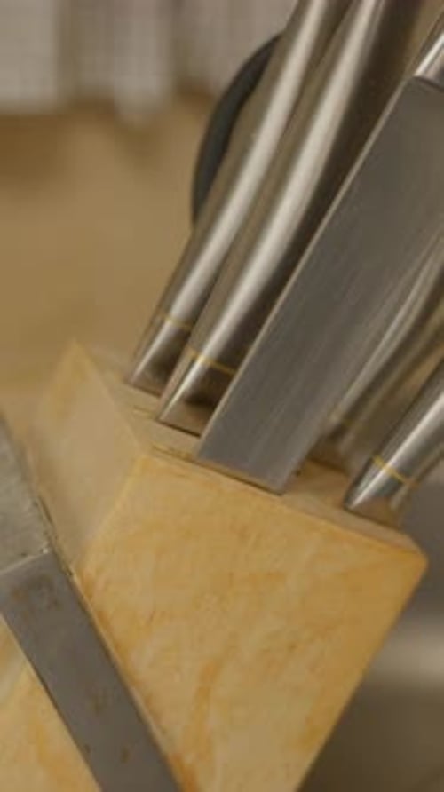 Removing Kitchen Knife From Wooden Block