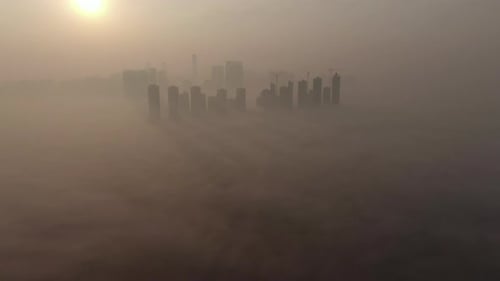A new town in the haze where the sun rises.