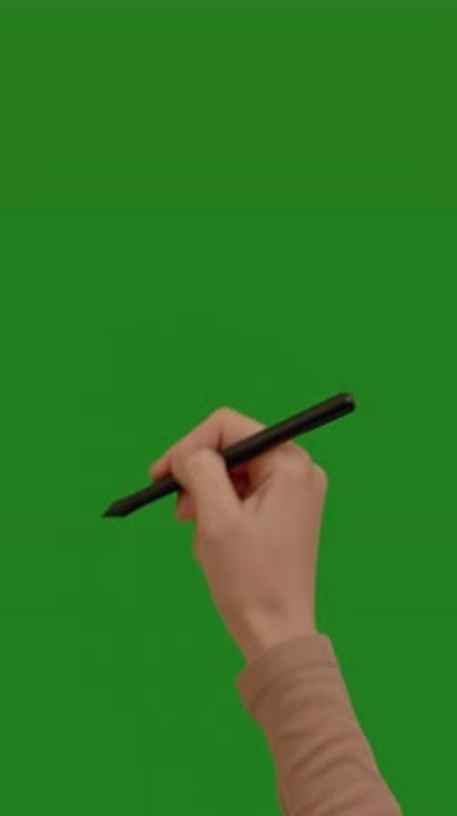 Gesten, weibliches Stiftstreichen auf dem Chroma-Key-Greenscreen-Hintergrund.