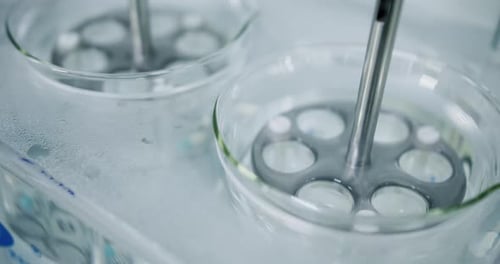 Close Up of Lab Equipment Mixing Tablets