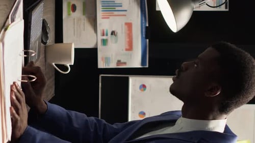 Adult Working at Desk in Modern Office