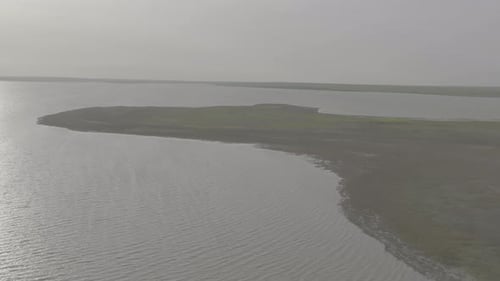 Water Surface With a Small Wave Waves on the Pond Surface Waves in Shallow Water Aerial View Flying