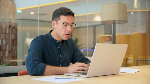 Busy Professional Business Man Using Laptop Working Sitting at Office Desk