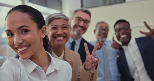 Business people, smile and peace sign for selfie in team building, social event