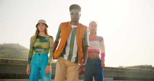 Face, group and friends in city, fashion and New York with stylish clothes, gen z and confidence