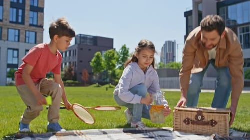 Family Picnic in the City Park on a Sunny Day