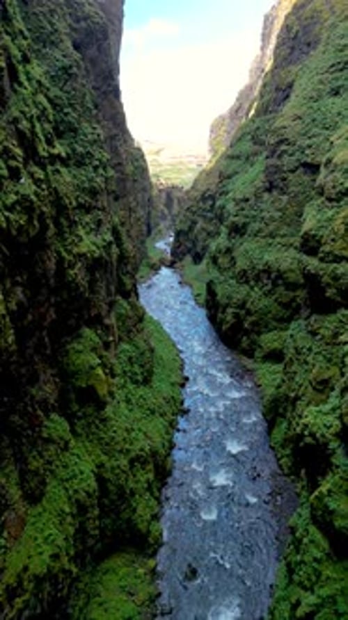 Exploring the Breathtaking Glymur Waterfall Canyon in Iceland