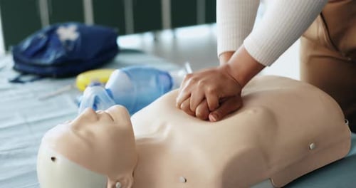 Performing CPR on Medical Training Dummy
