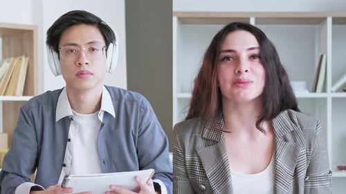 Two People Video Conferencing During Daytime