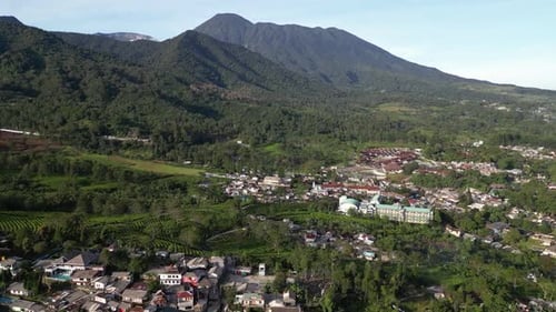 Aerial View of Green Valley With Mountain