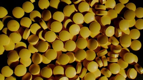 Pills and Vitamins Macro Close Up View of Womans Hands Holding Plenty of Different Drugs Painkillers